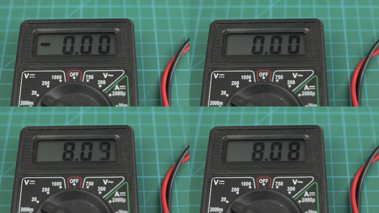 电子万用表工具通电。和测量电压测试。特写