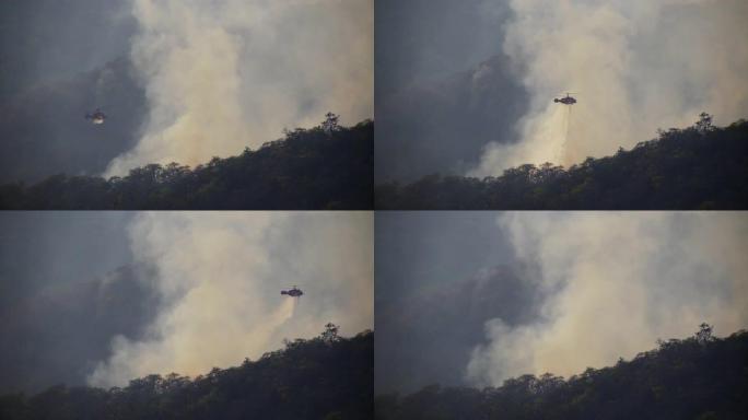 KA-32消防直升机在森林大火上滴水