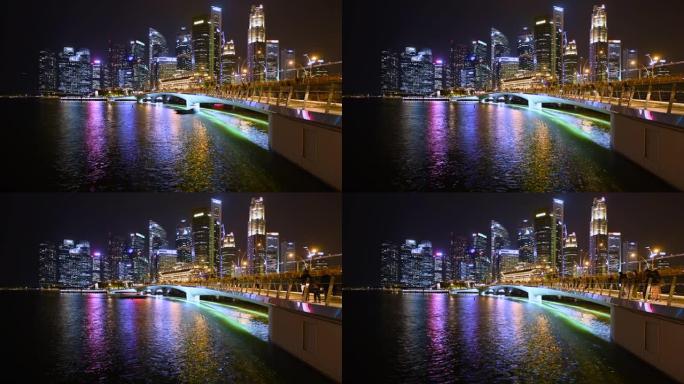 新加坡天际线的4k延时，许多游客走在新加坡的禧年桥上