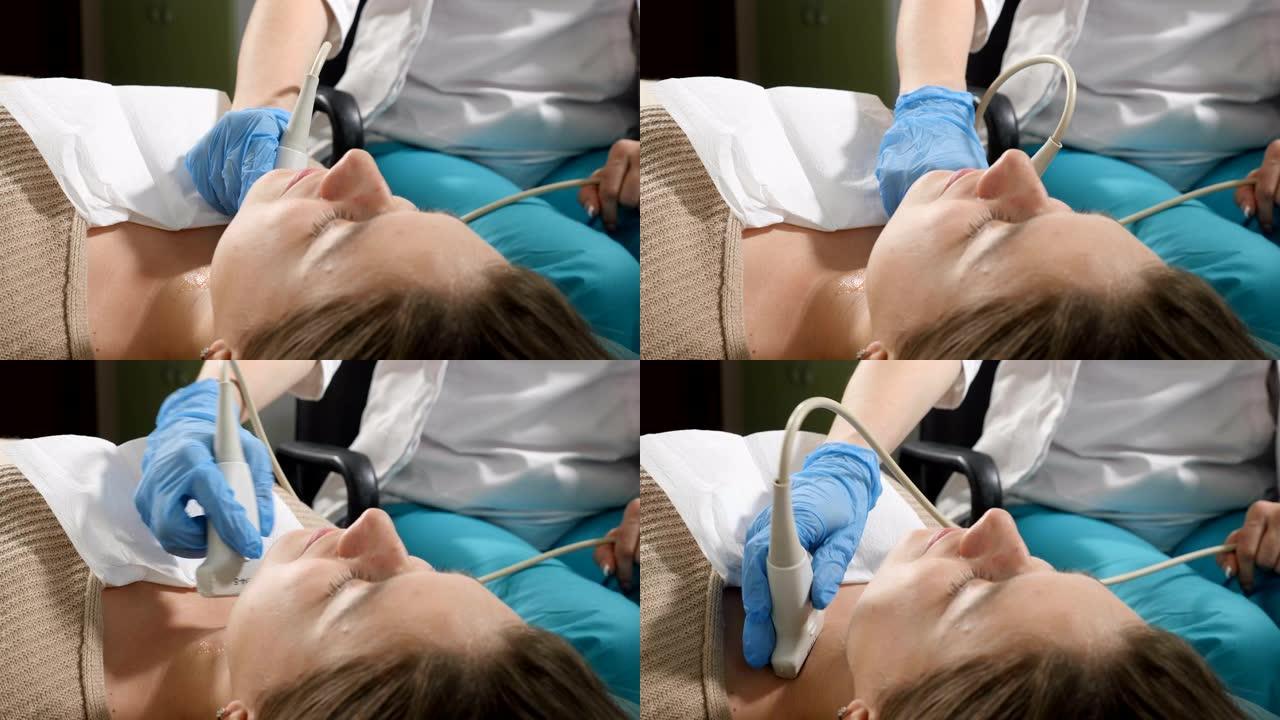 女医生检查病人。专科医生在医院为女患者做颈部超声检查。特写镜头。卫生保健的概念。4 k