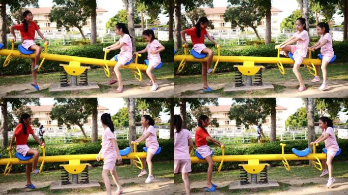 快乐的亚洲女孩一起在操场上玩海景。