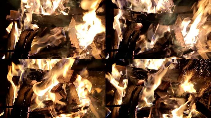 在烤架上燃烧木头，以便随后准备烧烤