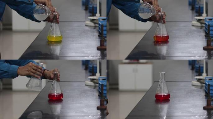 在化学实验室中，从圆锥形烧瓶中添加白色化学物质后，圆锥形烧瓶中黄色化学物质的颜色会发生变化。