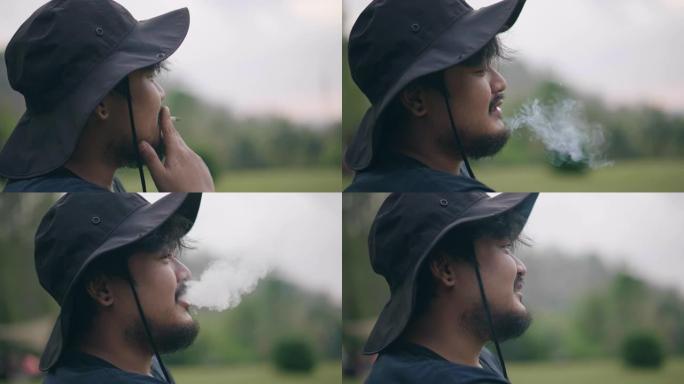 亚洲男子休息时吸烟库存视频