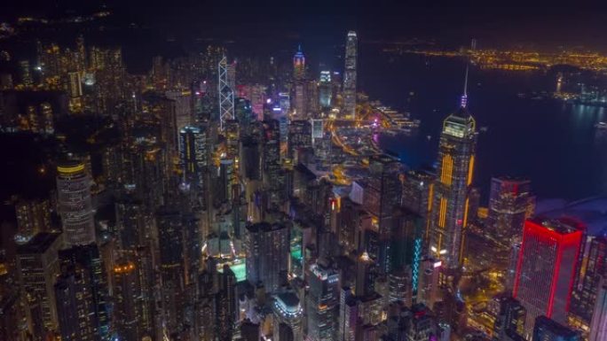 夜间照明飞行在香港市区空中全景4k延时