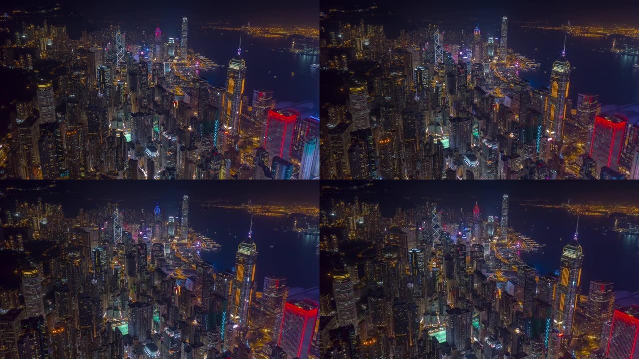 夜间照明飞行在香港市区空中全景4k延时