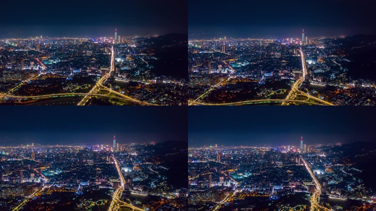 台北城市景观夜间照明交通路口屋顶空中全景4k延时台湾