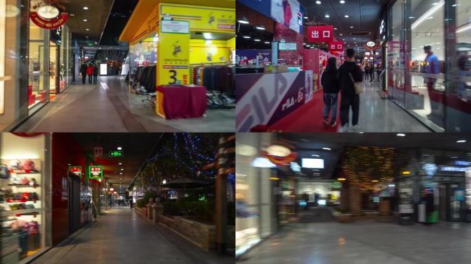 夜间杭州市区著名地下购物中心步行延时全景4k中国