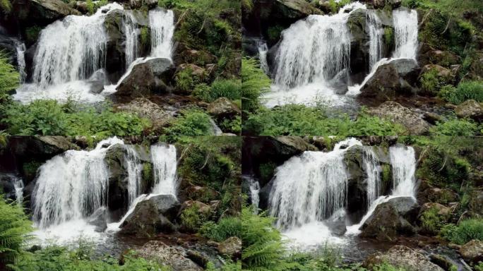 POV走向森林荒野美丽的瀑布。特里伯格·古塔赫河瀑布。自然的力量