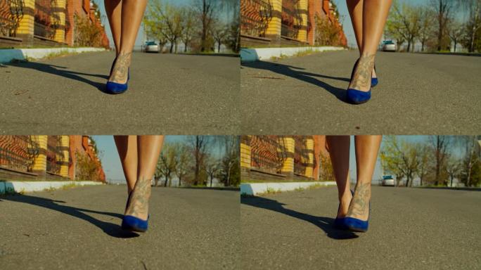 穿着细高跟鞋走在街上的女性腿