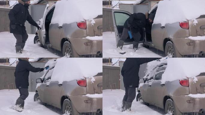 异常降雪气候变化一男子从雪中挖车