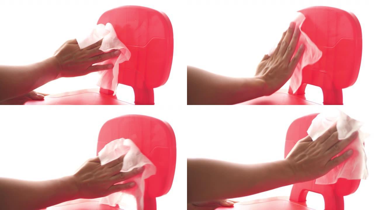 使用湿擦和酒精清洁红色椅子保护病毒