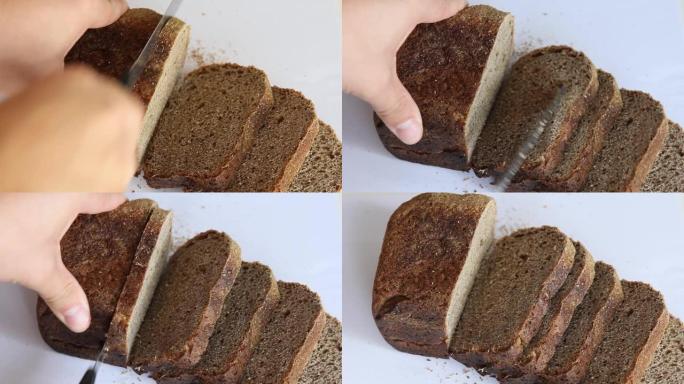 切成薄片的深色面包块，在白色背景上