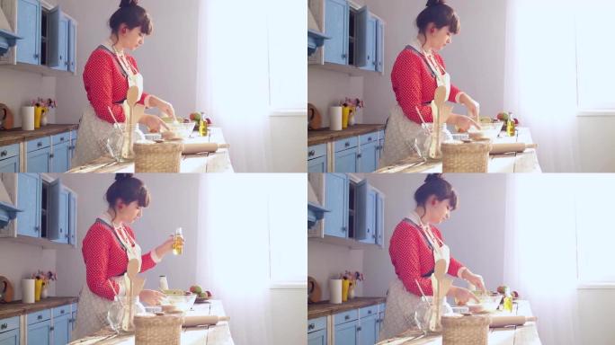 X8加快了一个年轻女孩在蓝色厨房做饭的镜头。美丽的女孩在明亮的阳光窗户上揉面团配料。Prores 4