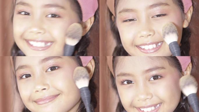 一个亚洲长发女孩在化妆时用刷脸的特写镜头。