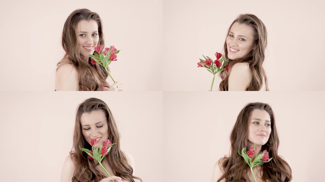 一位年轻漂亮的女人，有着棕色的波浪长发，手里拿着一朵红色的花，温柔地微笑着，调皮地转身