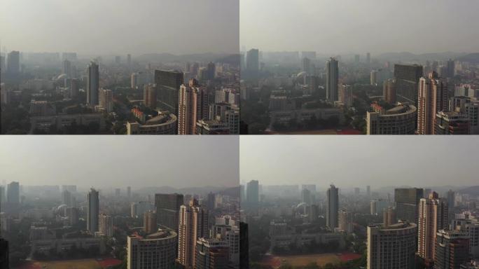 日落烟雾广州城市景观中央生活区空中全景4k中国