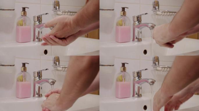 电晕病毒预防男子展示手卫生用热水肥皂洗手。使用皂液分配器