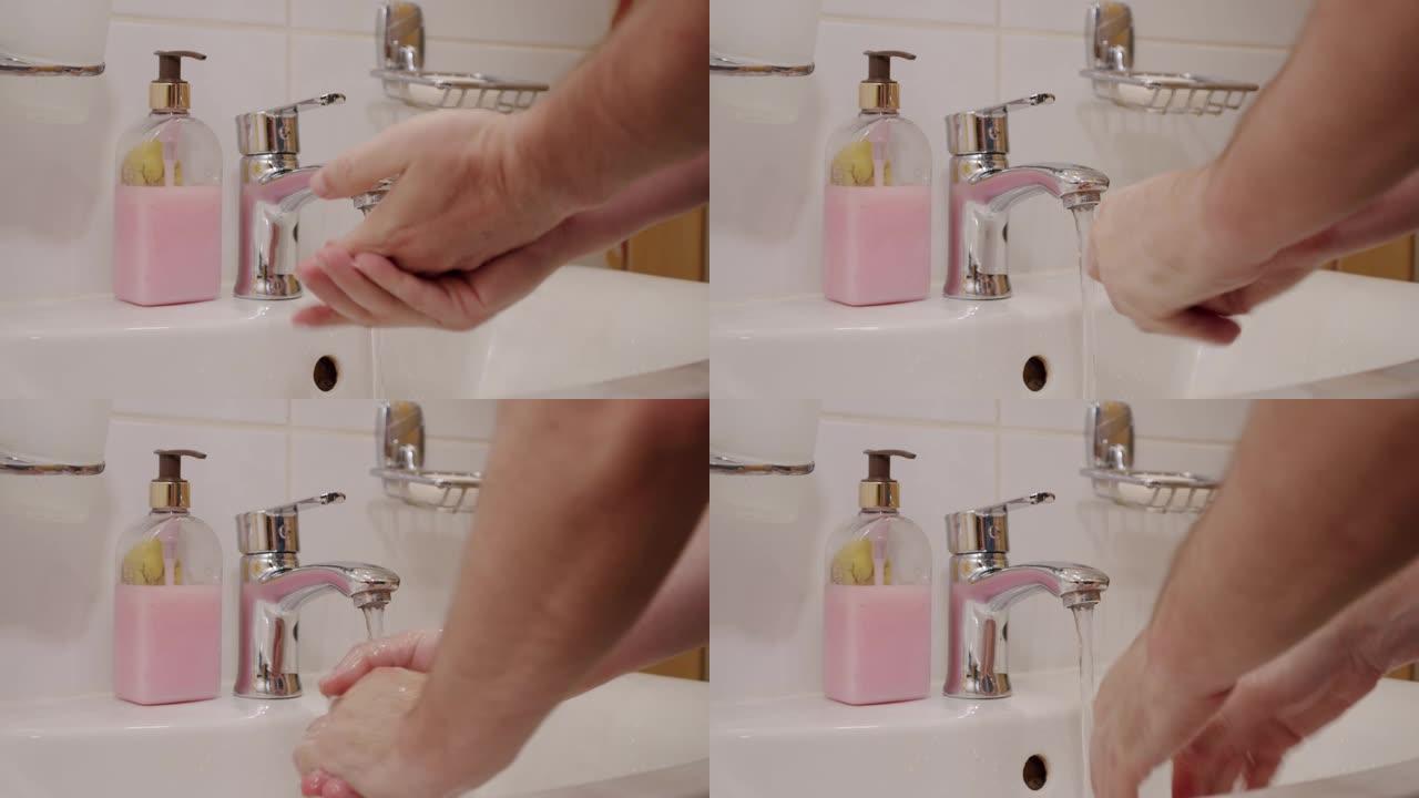 电晕病毒预防男子展示手卫生用热水肥皂洗手。使用皂液分配器