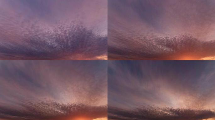 戏剧性的紫云在日出时在天空中朝着太阳光移动，最终完全覆盖了太阳，4k版本。延时云，b滚动射击。