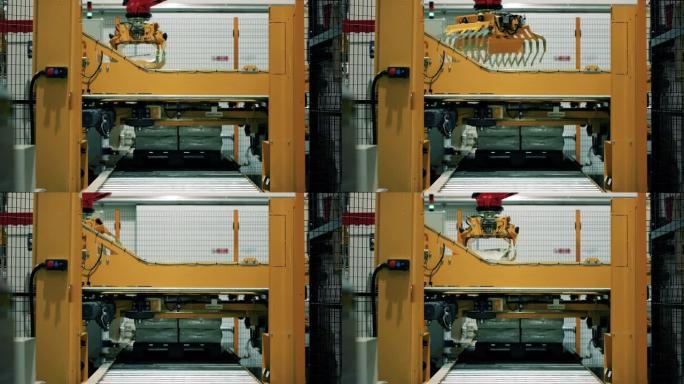 在工厂操作的码垛机器人。工业和工程过程中所需的自动化设备