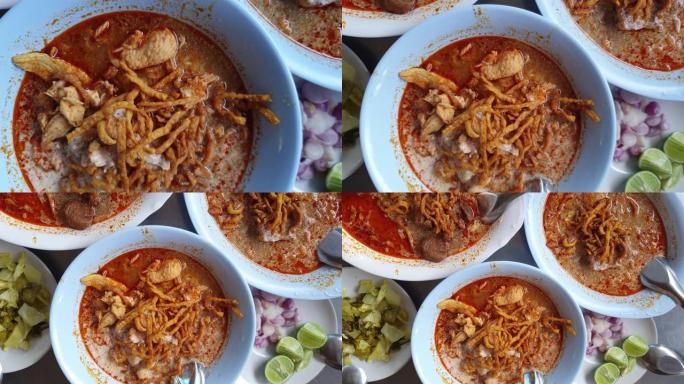 泰国北部美食Khao soi红咖喱椰奶汤面配香草