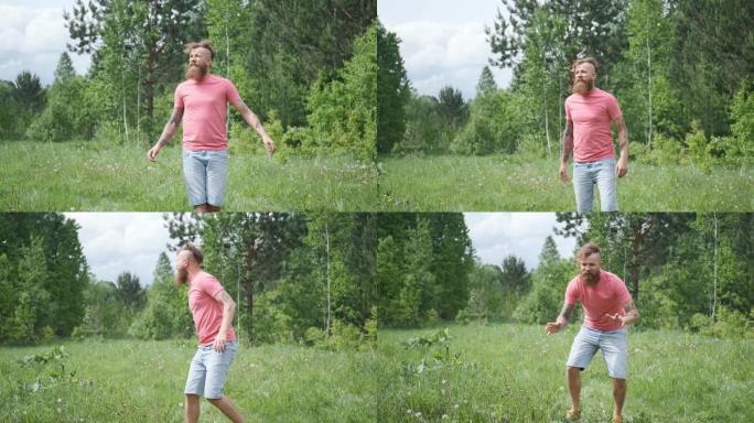 男人在草地上抓蝴蝶，穿着粉红色t恤和短裤的潮人，心情愉快