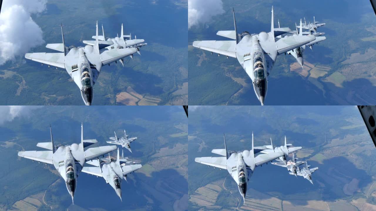 保加利亚和波兰空军Mikoyan Gurevich米格-29支点军用飞机在空中对空中4K编队