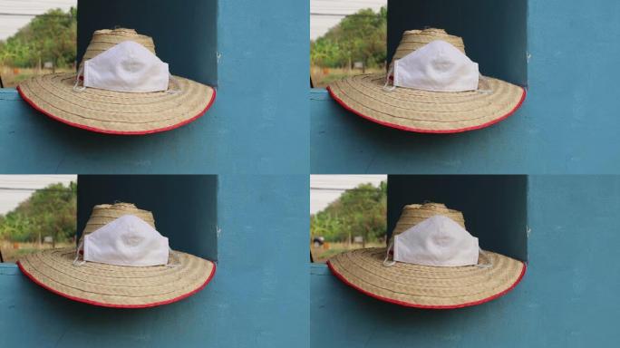 编织竹帽，带面具风落。