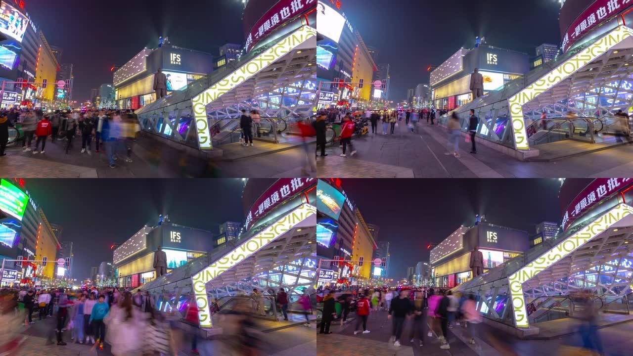 长沙市中心夜景照明拥挤步行街地铁入口全景延时4k中国