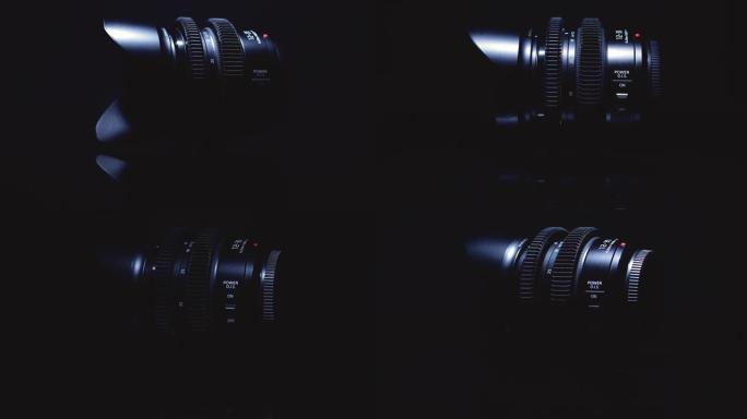 电影镜头在黑色背景上被艺术地照亮。先进的光学技术。