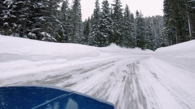 雪山森林结冰道路上的危险驾驶