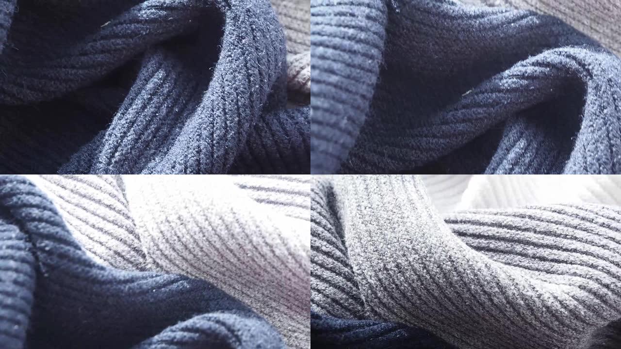 针织羊毛灰蓝色毛衣的背景和质地。漫不经心地皱巴巴的。
