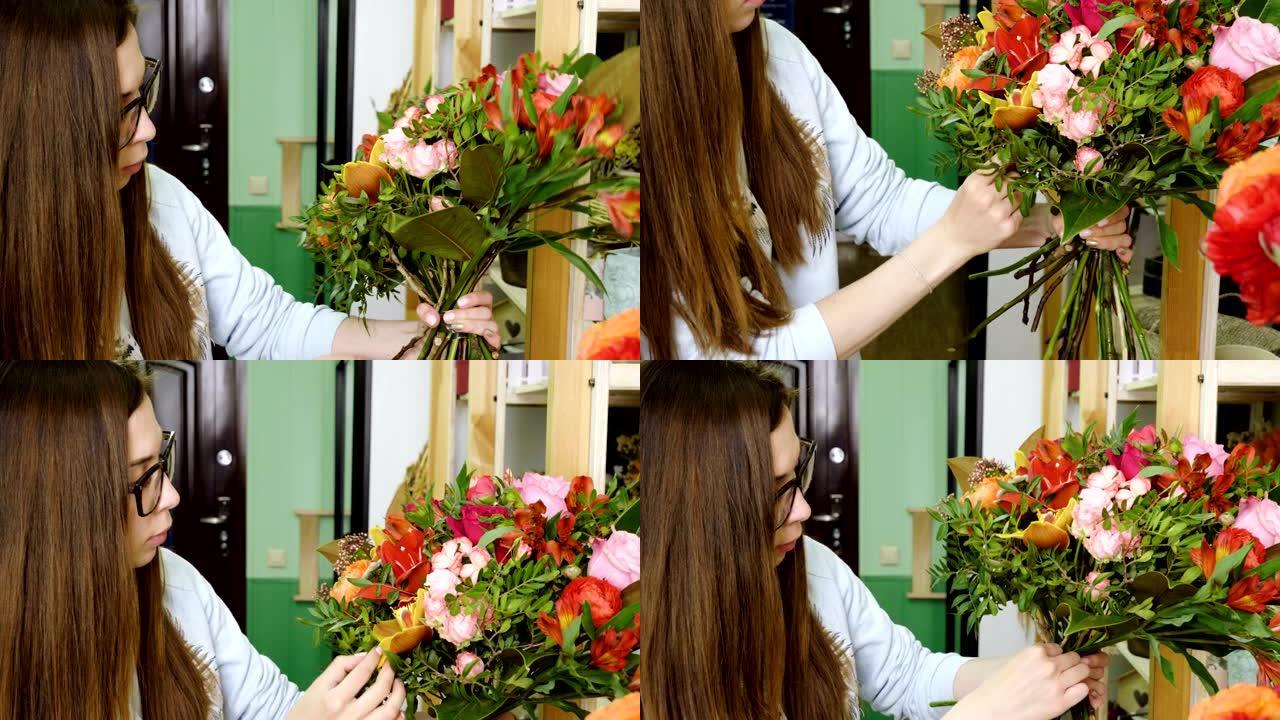 女性高加索花店在花店里做一束鲜花。4K