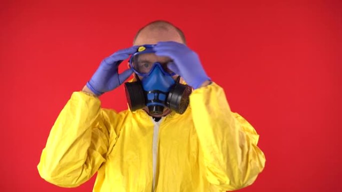 一个穿着黄色防护服和化学口罩的男人戴上安全眼镜。沃尔特·怀特的形象，海森堡。绝命毒师的概念。地下化学