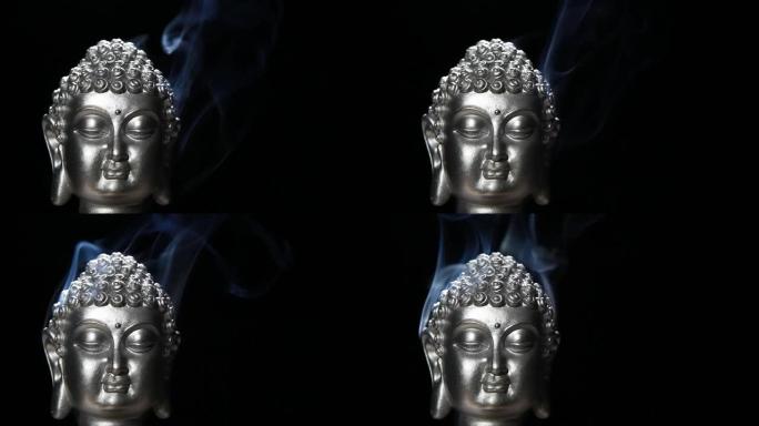 佛陀烟雾的镜头黑暗背景