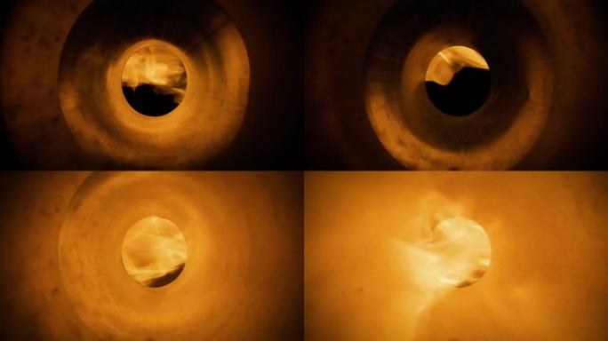火在金属管内蔓延。慢动作