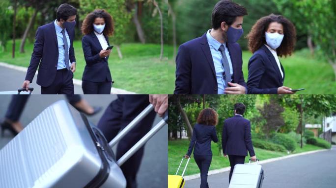 4k视频情侣同事在商务旅行中戴着防护口罩抵达酒店