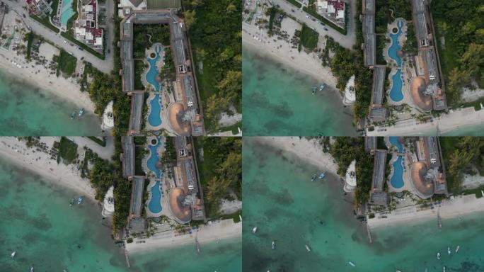 4k直接向下天线，日落时配有度假村游泳池和水晶加勒比海水