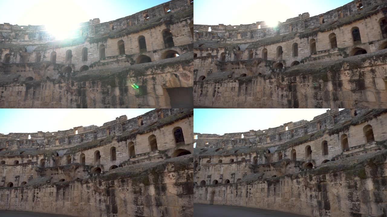 古罗马遗址。位于突尼斯El Jem的古代圆形剧场。全景。历史地标。阳光照在镜头里