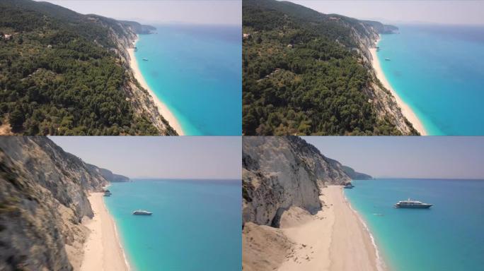 年轻人在Egremni海滩上方射击无人机是希腊和世界上最美丽的海滩之一