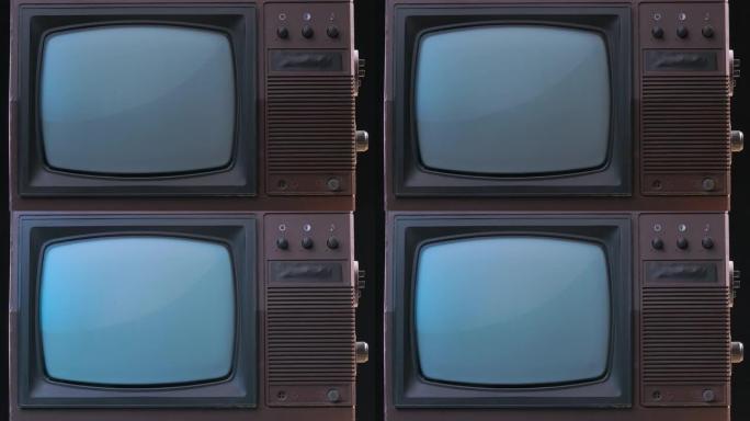 带切换器的棕色风格复古电视机。老式电视在烟熏演播室背景下，带有蓝色霓虹灯和灰尘颗粒。慢动作