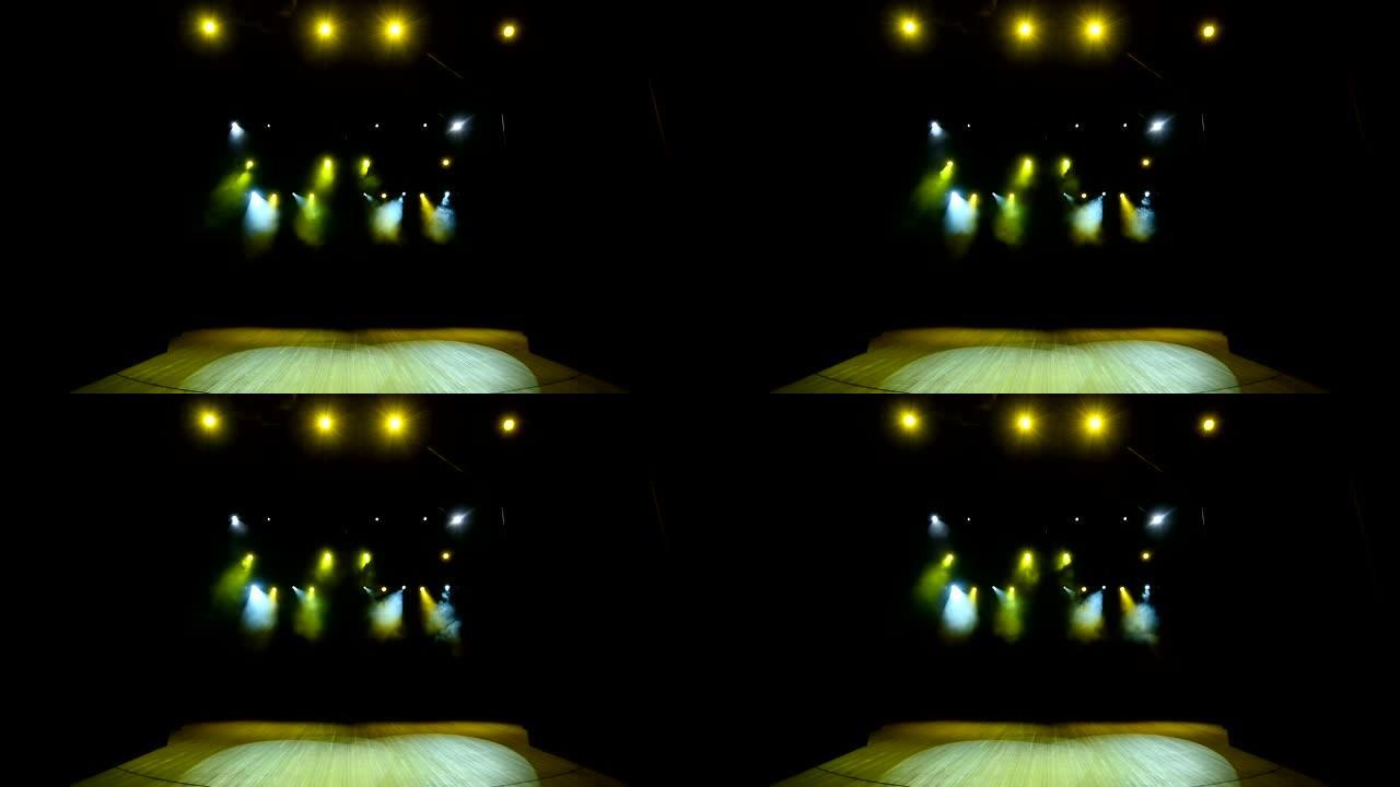 黄色灯光的舞台背景上的音乐会