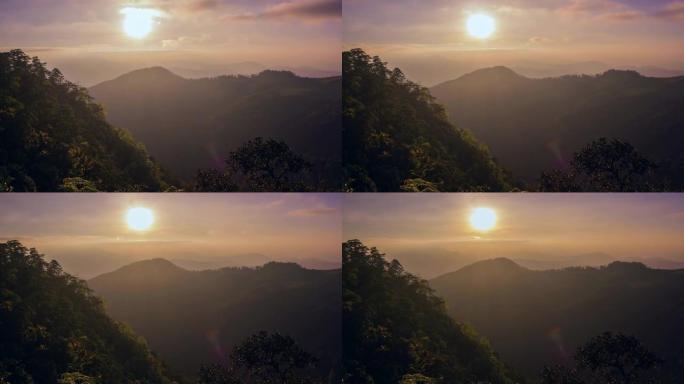 高山和森林上的日落