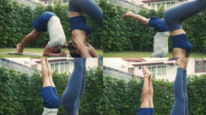 年轻的健身夫妇在房子的花园里练习倒立瑜伽。亚洲妇女和白人男子在公园里锻炼和伸展身体，同时倒立