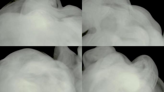 黑色背景上的白烟或雾。沸腾是蒸汽或化学物质的气态云的冒泡。化学中试剂的光滑滚动有毒气体云。运动中的毒