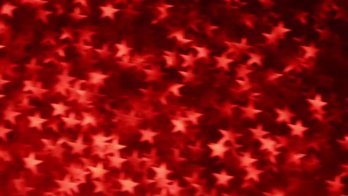 节日模糊的红色背景，带有星星。