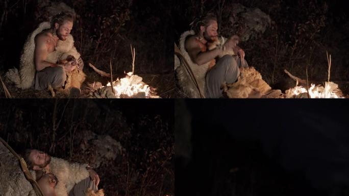 晚上在篝火旁吃羊皮的男人