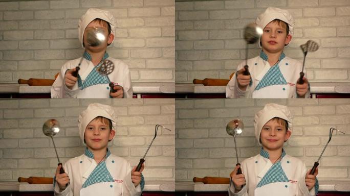 在家庭厨房里戴着厨师帽的高加索小男孩，戴着金属钢包。儿童用厨房用具做饭。带钢包的男孩厨师。选择性聚焦