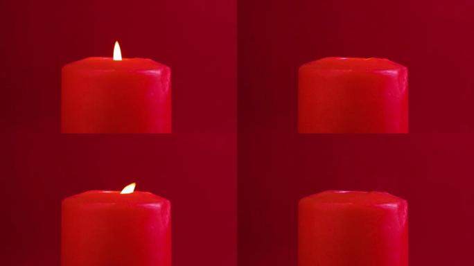 红色蜡烛燃烧并在红色背景下熄灭。视频剪辑高清